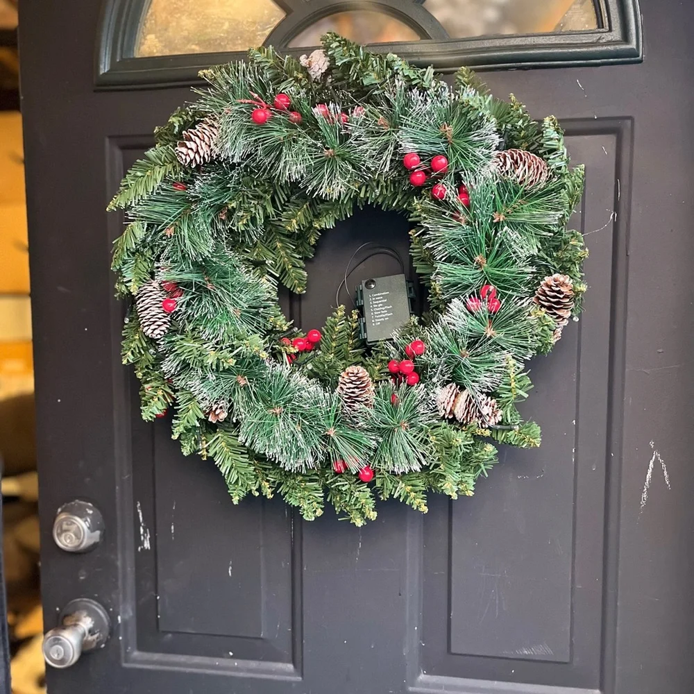 Festive Green Holiday Wreath with Red Accents